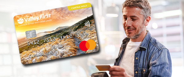 A man paying by tapping his credit card